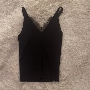 Black tank top with lace around V neck